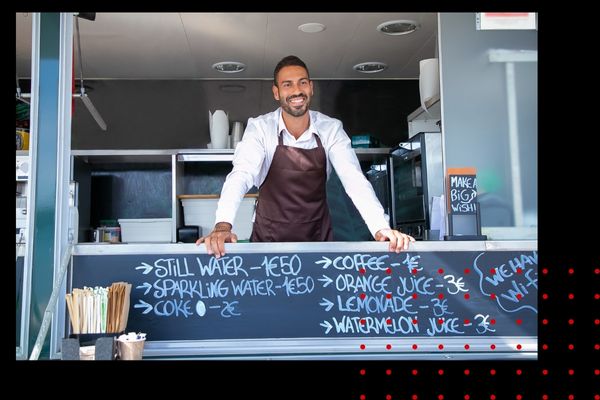 a custom food trailer with a service window in the side of the custom cargo trailer